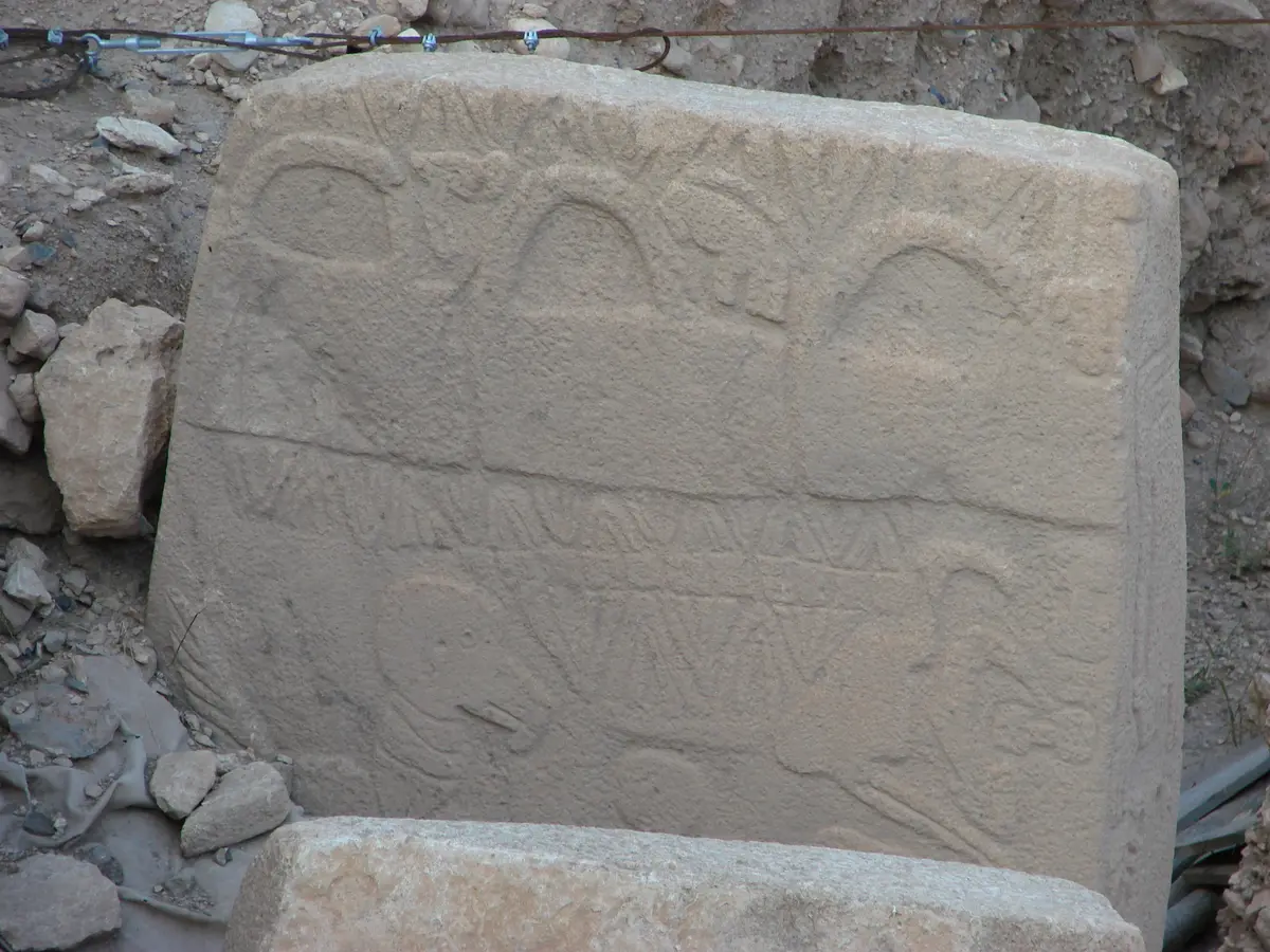 Pillar 43, with carved reliefs, in Enclosure D.