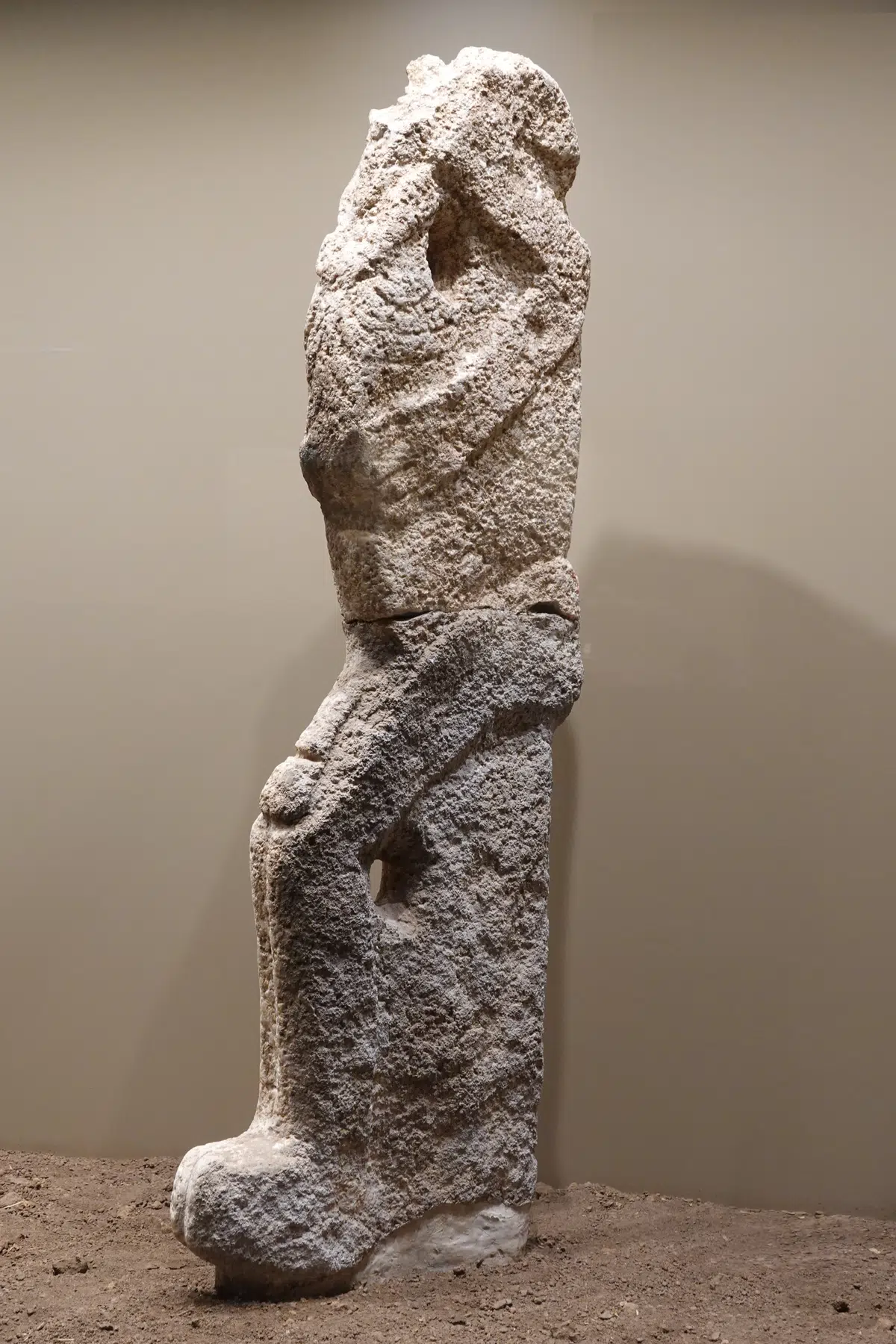 A seated human statue from Karahan Tepe in the Şanlıurfa Archaeology Museum.